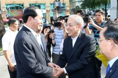 Chủ tịch nước Trần Đại Quang đến thăm, nói chuyện và chúc mừng đồng bào Công giáo tại Giáo xứ Chính tòa, Tổng Giáo phận Thành phố Hồ Chí Minh. (Ảnh: Nhan Sáng/TTXVN)