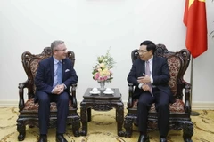 Phó Thủ tướng, Bộ trưởng Bộ Ngoại giao Phạm Bình Minh tiếp Bộ trưởng Văn phòng Tổng thống Ba Lan Krzysztof Szczerski. (Ảnh: An Đăng/TTXVN)