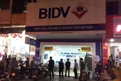 Chi nhánh ngân hàng BIDV bị cướp. (Ảnh Hồ Cầu/TTXVN)
