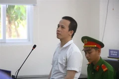 Bị cáo Trần Trọng Luận (34 tuổi, ngụ tại Bình Dương) nhận mức án tử hình đối với tội danh giết người, 6 năm tù với tội danh cướp tài sản. (Ảnh: Huyền Trang/TTXVN)