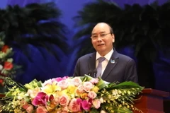 Thủ tướng Nguyễn Xuân Phúc phát biểu kết luận buổi đối thoại. (Ảnh: Văn Điệp/TTXVN)