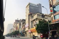 Công trình cao 7 tầng và 1 tum tại 174-176 Nguyễn Xiển (phường Hạ Đình, quận Thanh Xuân, Hà Nội) phát hiện xây sai phép tầng tum từ năm 2014 nhưng giữa năm 2019 mới xử lý xong vi phạm. (Ảnh: Minh Nghĩa/TTXVN)