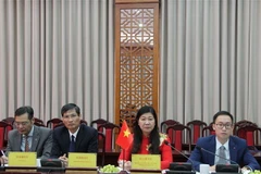 Đoàn cán bộ, lãnh đạo Ủy ban Mặt trận Tổ quốc Việt Nam thành phố Hà Nội tại buổi hội đàm. (Ảnh: Nguyễn Thắng/TTXVN)