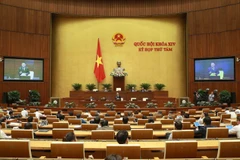 Tổng Kiểm toán Nhà nước Hồ Đức Phớc báo cáo, làm rõ một số vấn đề đại biểu Quốc hội nêu. (Ảnh: Doãn Tấn/TTXVN)