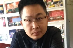 Đối tượng Hồ Đức Anh tại cơ quan điều tra. (Ảnh: TTXVN)