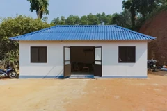 Ngôi nhà được làm gần như hoàn toàn bằng vật liệu fibro ximăng của gia đình anh Quang sau khi hoàn thiện. (Nguồn: Vietnam+)