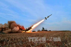 Một vụ bắn đạo pháo của Triều Tiên (Ảnh minh họa: AFP/.TTXVN)