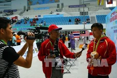 Vận động viên Võ HUỳnh Anh Khoa giành HCV đầu tiên cho đoàn Việt Nam (Nguồn: TTXVN)