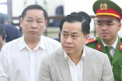 Bị cáo Phan Văn Anh Vũ (sinh năm 1975, Chủ tịch Hội đồng quản trị Công ty cổ phần Xây dựng 79, Công ty cổ phần Bắc Nam 79, Công ty TNHH I.V.C, Công ty cổ phần đầu tư Nhất Gia Phúc). (Ảnh: Doãn Tấn/TTXVN)