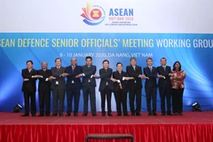 Đại biểu tham dự hội nghị chụp ảnh chung. (Ảnh: Trần Lê Lâm/TTXVN)