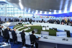 Các đại biểu thảo luận tại Hội nghị thượng đỉnh G20 ở Rome, Italy, ngày 30/10. (Ảnh: AFP/TTXVN)