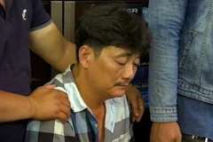 Bị can Trần Công Xuân thời điểm bị cơ quan công an khởi tố, tạm giam về tội "Hủy hoại tài sản". (Ảnh: TTXVN phát)