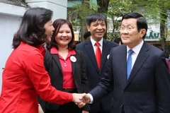 Chủ tịch nước Trương Tấn Sang với các đại biểu. (Ảnh: Nguyễn Khang/TTXVN)