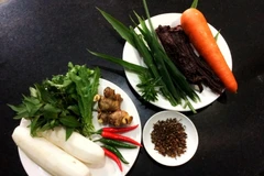 Món thịt khô trong ngày Tết dân tộc của người đồng bào dân tộc thiểu số Tây Nguyên. (Ảnh: Hồng Điệp/TTXVN)