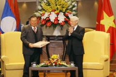 Tổng Bí thư Nguyễn Phú Trọng và Tổng Bí thư, Chủ tịch nước Lào Bounnhang Vorachith. (Nguồn: TTXVN)