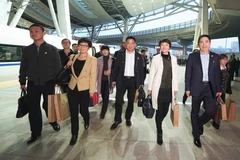 Các đại biểu của tỉnh An Huy tới thủ đô Bắc Kinh tham dự Đại hội, ngày 15/10. (Nguồn: THX/TTXVN)