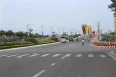 Người dân thực hiện cách ly toàn xã hội, các tuyến đường Đà Nẵng thưa vắng người ra đường. (Ảnh: Trần Lê Lâm/TTXVN)