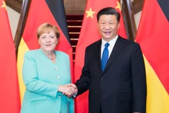 Chủ tịch Trung Quốc Tập Cận Bình (phải) và Thủ tướng Đức Angela Merkel (trái) tại cuộc gặp ở Bắc Kinh, Trung Quốc, ngày 6/9. (Ảnh: THX/TTXVN)