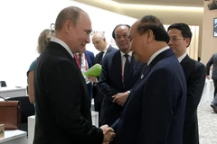 Thủ tướng Nguyễn Xuân Phúc gặp Tổng thống Nga Vladimir Putin. (Ảnh: TTXVN) 