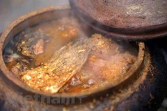Món cá kho làng Vũ Đại nức tiếng gần xa (Ảnh: Phan Xâm/Vietnam+)