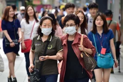 Người dân Hàn Quốc. (Ảnh: AFP/TTXVN)