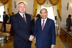 Thủ tướng Nguyễn Xuân Phúc gặp Quyền Thống đốc Saint Petersburg Beglov A.D. (Ảnh: Thống Nhất/TTXVN)