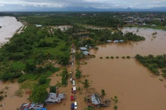 Một trận lũ lụt ở Indonesia. (Ảnh: AFP/TTXVN)