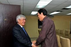 Phó Trưởng Ban Quan hệ quốc tế Trung ương Đảng Cộng sản Cuba Juan Carlos Marsán tiếp Phó Bí thư Thường trực Tỉnh ủy Sơn La Nguyễn Đắc Quỳnh. (Ảnh: Vũ Hà/TTXVN0