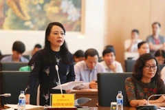 Bộ trưởng Bộ Y tế Nguyễn Thị Kim Tiến trình bày báo cáo giải trình về chất lượng và hiệu quả của mạng lưới y tế cơ sở. (Ảnh: TTXVN)