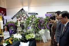 Lễ viếng Cựu Tổng thống Cộng hòa Nam Phi Nelson Mandela tại Thành phố Hồ Chí Minh. (Ảnh: Thế Anh/TTXVN)