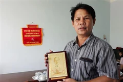 Anh Lê Văn Tám, người đã 47 lần hiến máu tình nguyện. (Ảnh: Nguyễn Thành/TTXVN) 