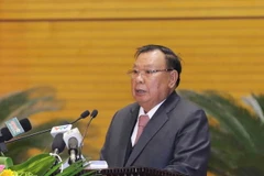 Tổng Bí thư, Chủ tịch nước Lào Bounnhang Vorachith nói chuyện với các đại biểu. (Ảnh: Phương Hoa/TTXVN)