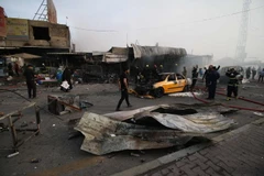 Hiện trường một vụ đánh bom đẫm máu ở Baghdad. (Nguồn: AFP/TTXVN)