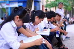 Thí sinh trong kỳ thi trung học phổ thông Quốc gia 2015. (Ảnh: Quý Trung/TTXVN)