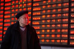 Bảng tỷ giá chứng khoán tại Giang Tô, Trung Quốc. (Nguồn: THX/TTXVN) 