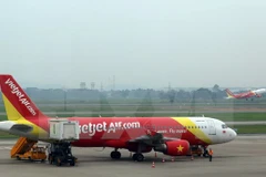 Tàu bay của VietJet Air đi từ sân bay quốc tế Nội Bài (Hà Nội). (Ảnh: Huy Hùng/TTXVN)
