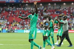 Các cầu thủ Senegal ăn mừng chiến thắng trong trận gặp Ba Lan. (Ảnh: THX/TTXVN)