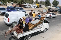 Người dân Syria rời bỏ nhà cửa đi lánh nạn do lo ngại xung đột leo thang tại tỉnh Idlib ngày 9/9. (Nguồn: AFP/TTXVN)