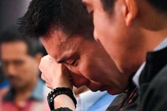 Lee Chong Wei bật khóc tại buổi họp báo thông báo giải nghệ. (Nguồn: AFP) 