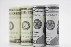 Đồng USD tại một ngân hàng ở Washington, DC. (Nguồn: THX/TTXVN) 