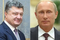 Tổng thống Nga Vladimir Putin (phải) và người đồng cấp Ukraine Petro Poroshenko (trái). (Nguồn: The Telegraph/TTXVN) 