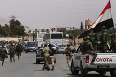 Các lực lượng Syria tăng cường an ninh tại Damacus ngày 9/4. (Nguồn: AFP/TTXVN)