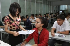 Sinh viên trong phòng thi trường Đại học Công Nghiệp Thành phố Hồ Chí Minh. (Ảnh: Phương Vy​/TTXVN)