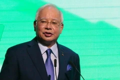 Thủ tướng Malaysia Najib Razak kêu gọi tăng cường tìm kiếm các thành viên hải quân bị mất tích. (Nguồn: EPA/TTXVN)