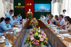 Quang cảnh buổi làm việc và ký kết biên bản hợp tác. (Ảnh: Đỗ Trưởng/TTXVN)