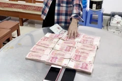 Quảng Ninh: Bắt giữ hai đối tượng vận chuyển trái phép ngoại tệ 