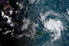 Hình ảnh ghi từ vệ tinh NOAA/RAMMB cho thấy bão Dorian quét qua vùng lãnh thổ Pueto Rico thuộc Mỹ trên vùng biển Caribe ngày 29/8/2019. (Nguồn: AFP/TTXVN) 
