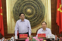 Trưởng Ban tổ chức Trung ương Phạm Minh Chính đánh giá cao công tác an sinh xã hội, xóa đói giảm nghèo trên địa bàn tỉnh Thanh Hóa. (Ảnh: Trịnh Duy Hưng/TTXVN)