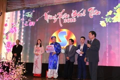 Gây quỹ từ thiện trong Tết Cộng đồng tại Sapa. (Ảnh: Quang Vinh/Vietnam+)