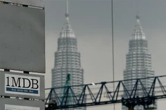 Biểu tượng 1MDB tại Kuala Lumpur, Malaysia. (Nguồn: AFP/TTXVN) 